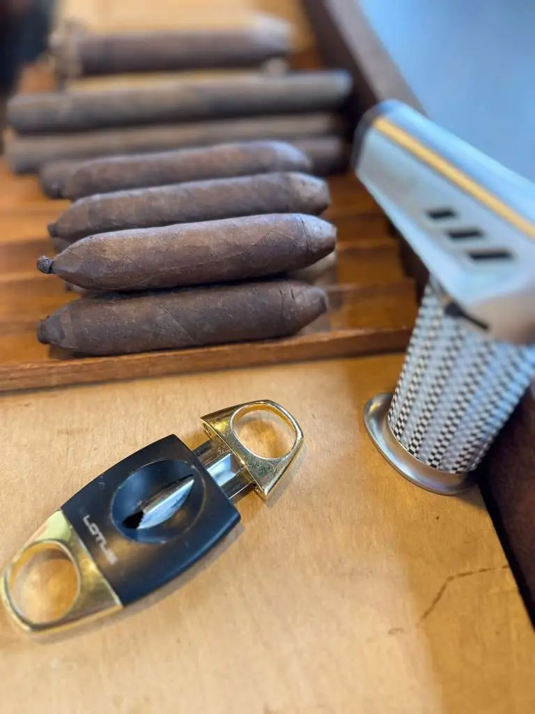 Cigar cutter and lighter